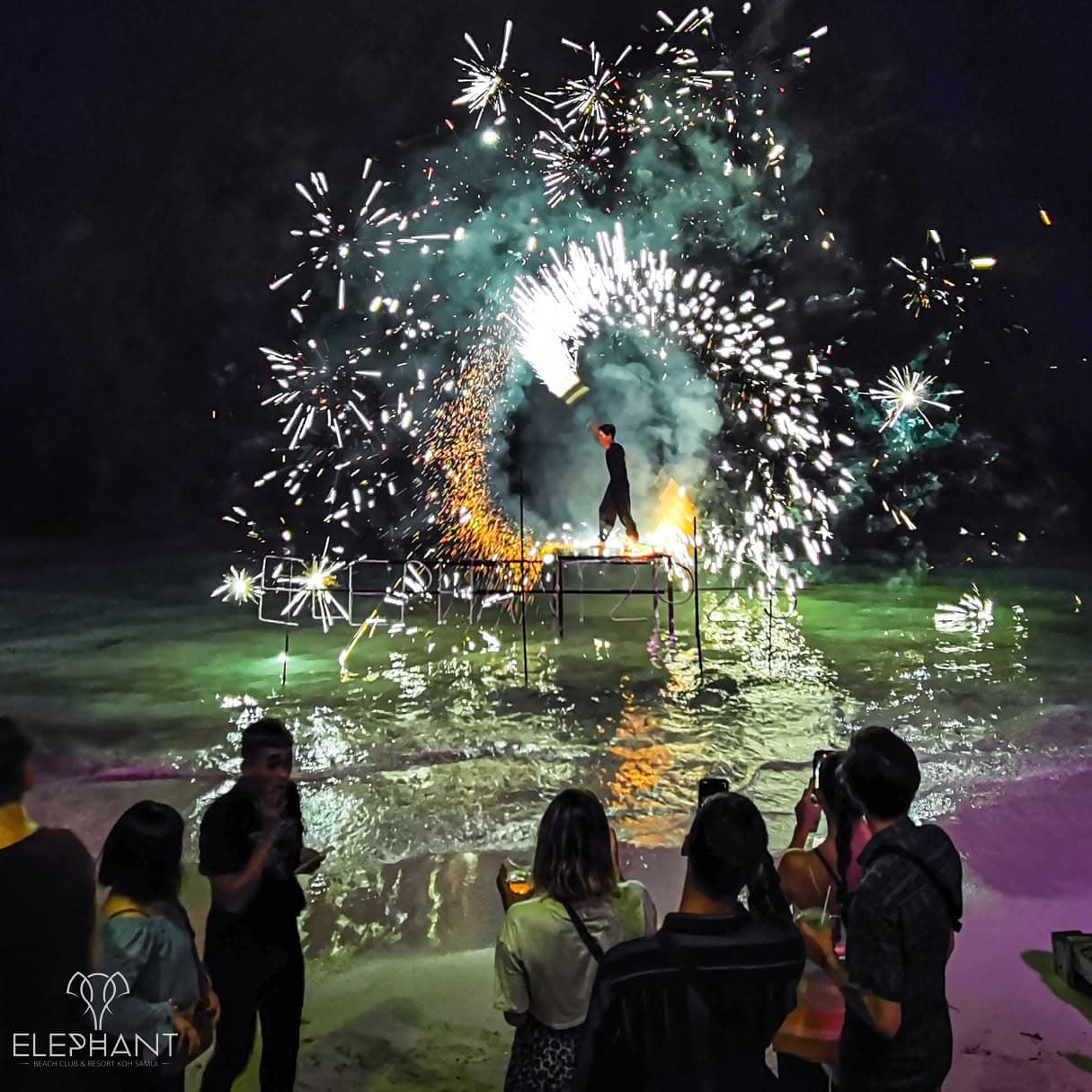 Flames lighting up the night sky above the beach club terrace at Elephant, Chaweng Beach