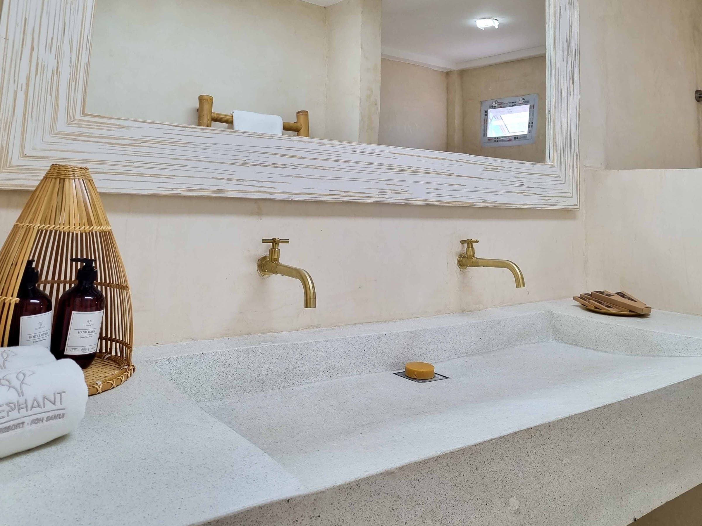 Brass taps and Elephant amenities on the Luxe Bungalow vanity