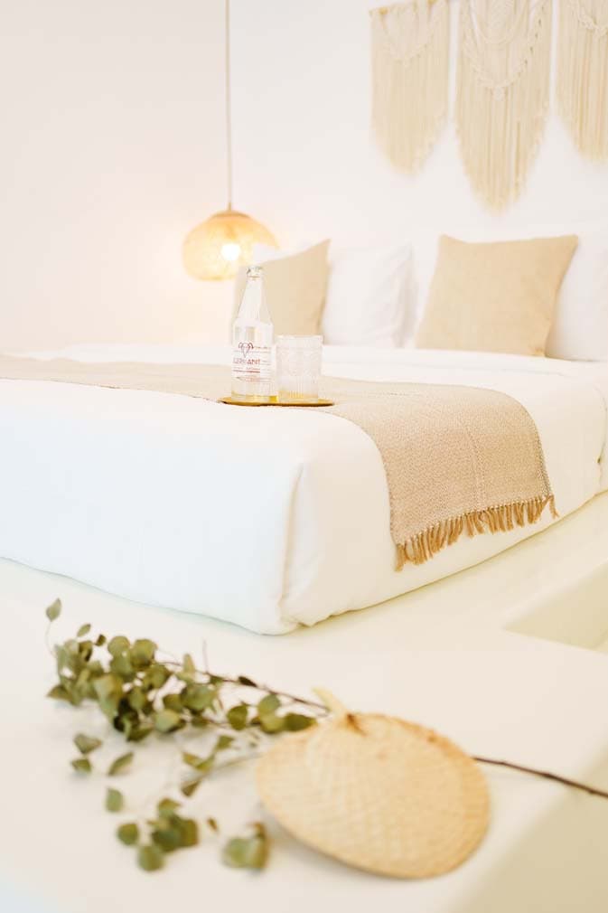 Linen throw and Elephant bottled water at the foot of the Villa bed, Chaweng Beach