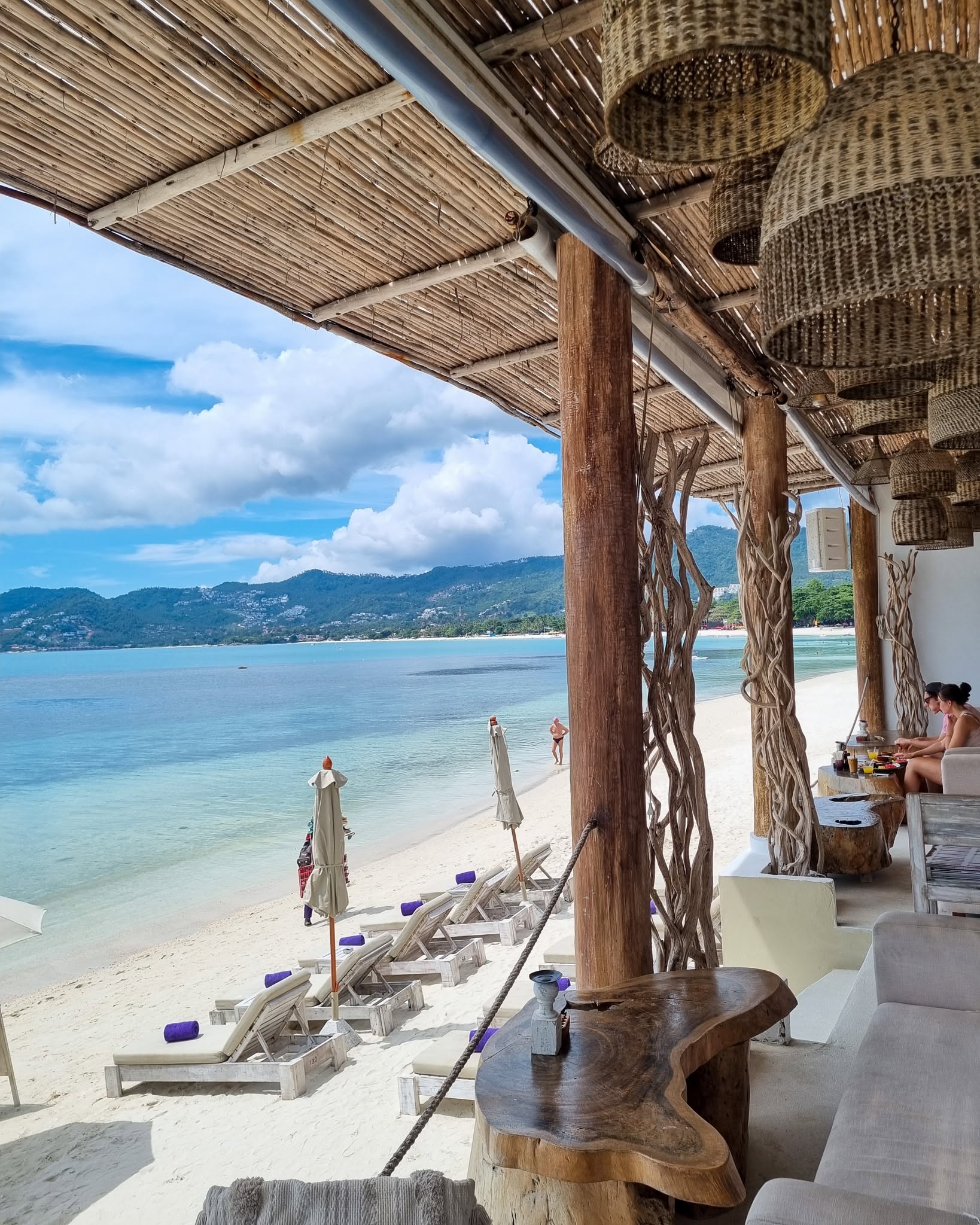 Rattan-lantern terrace looking over the sunbeds and the sea at Elephant, Chaweng Beach